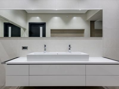 Modern bathroom with double vessel sink