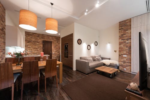 Brown Wooden Table Near White Couch