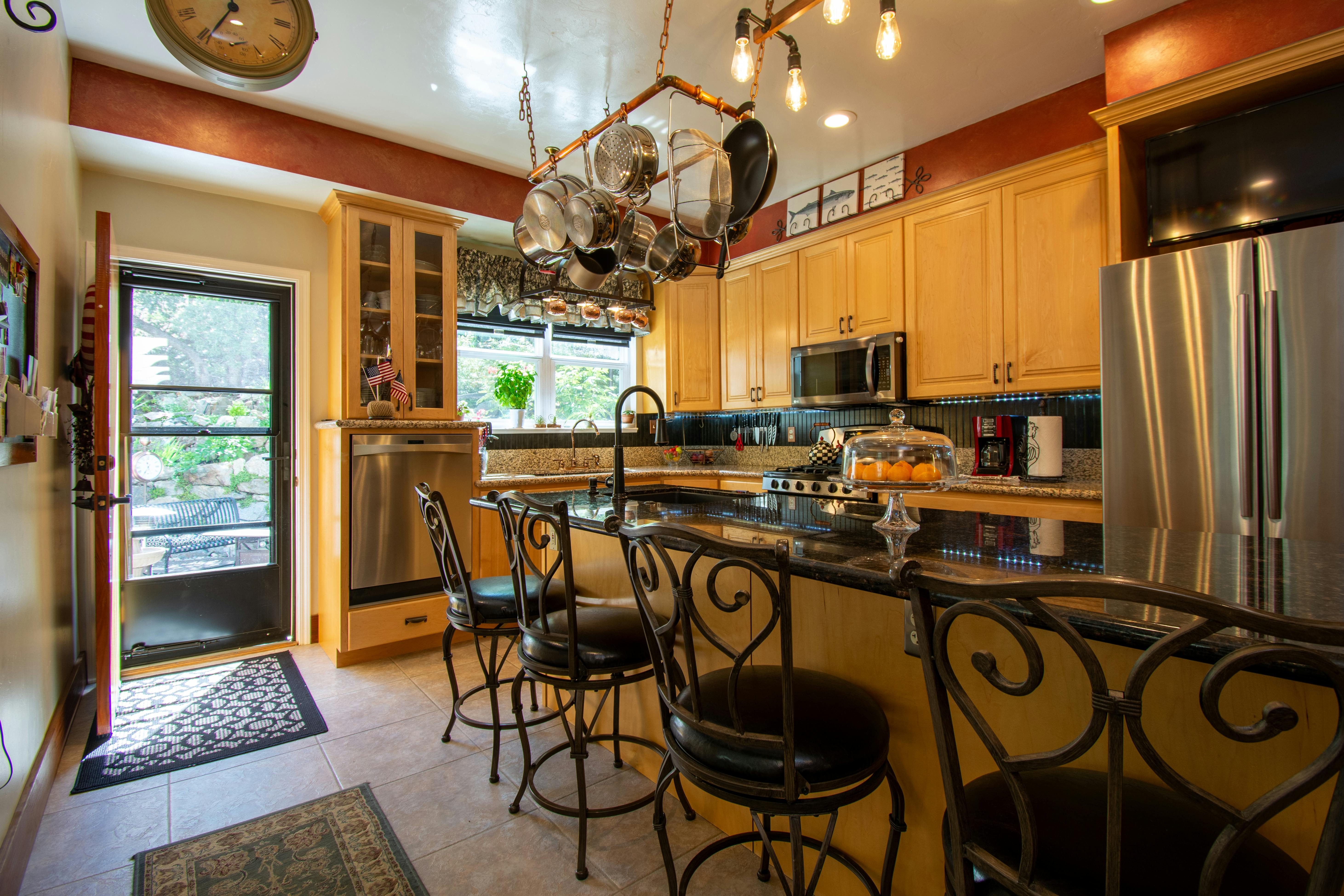 Free Black Metal Bar Stools in a Kitchen Stock Photo