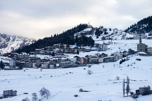 Picturesque snowy town of Bormio, Lombardy nestled in winter mountains.