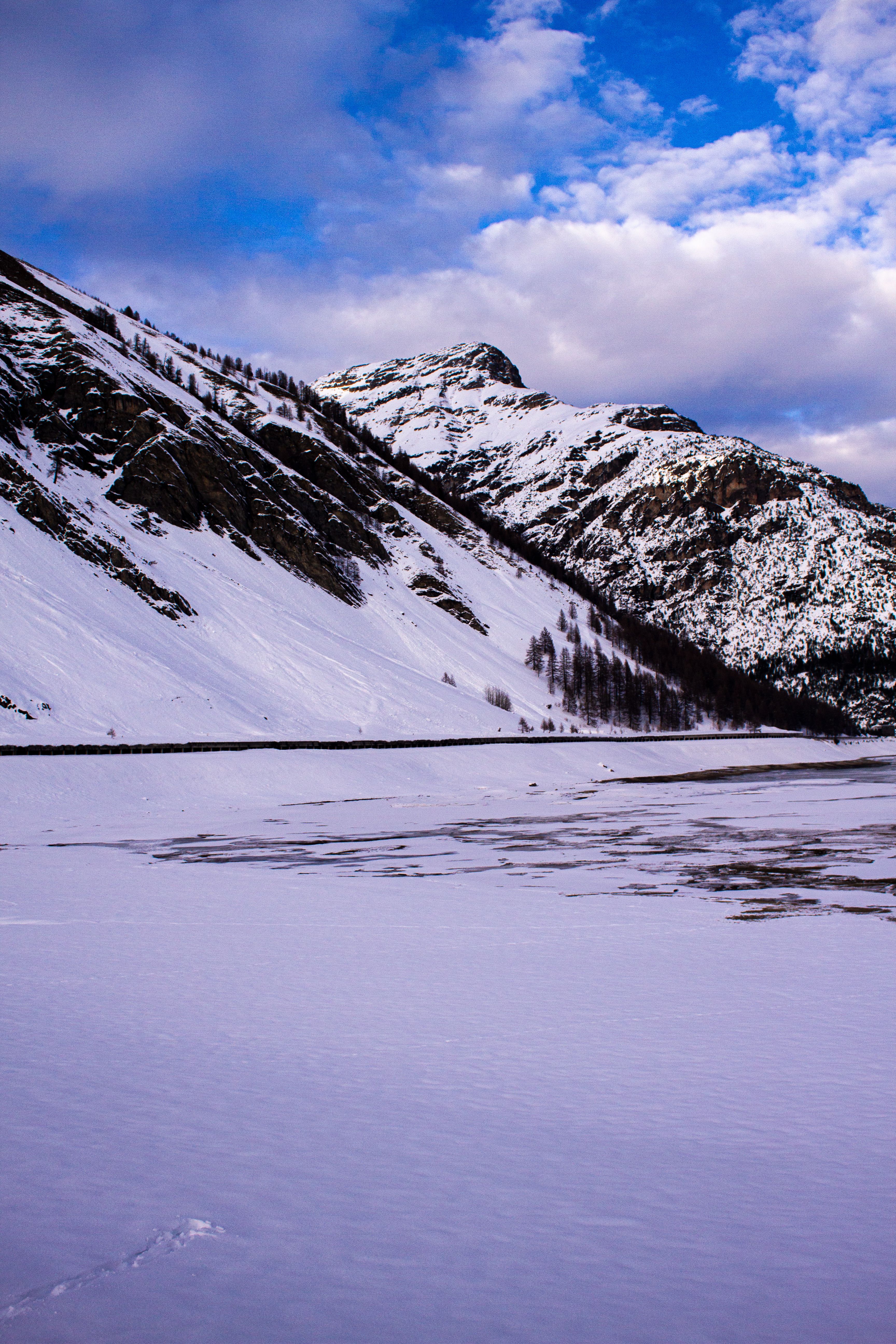 Snow Covered Mountains Under Blue Sky · Free Stock Photo