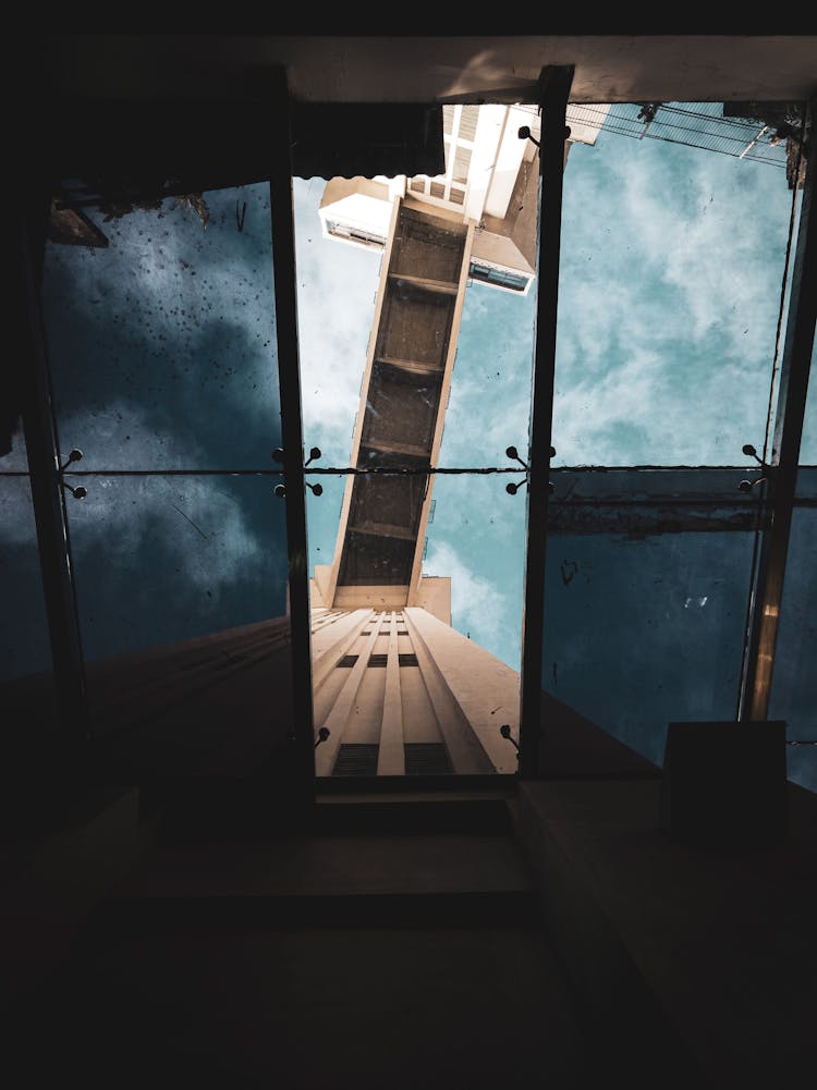 Low Angle Shot Of Broken Glass Ceiling