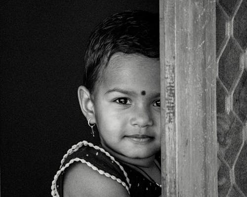 Free Grayscale Photography of a Cute Little Girl Stock Photo