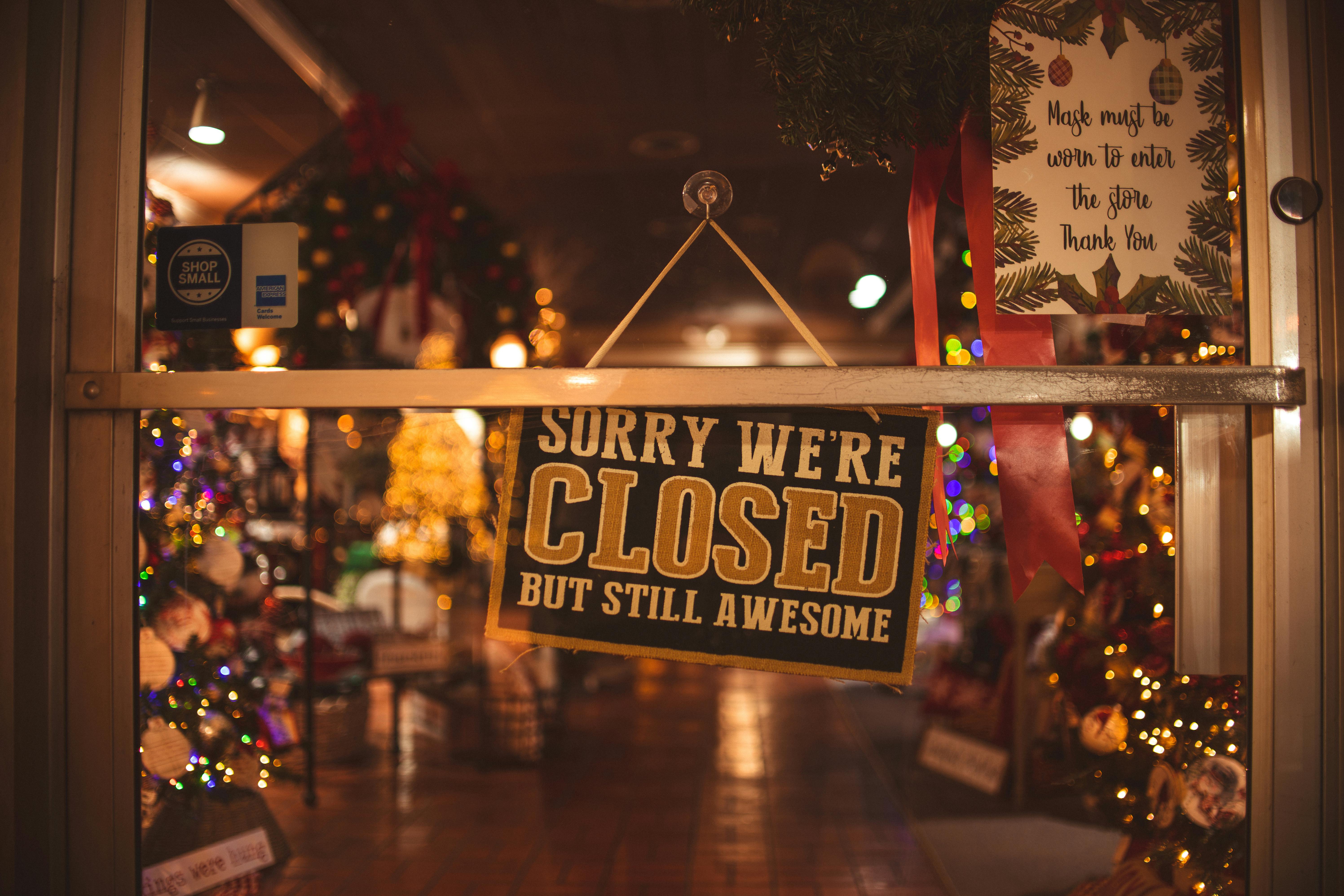 A Closed Signage on the Glass Door · Free Stock Photo