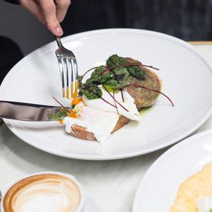 Breakfast eggs plated with greens — photo by Maria Bortolotto on Pexels