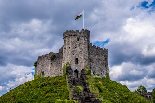 An Old Castle Under Cloudy Sky