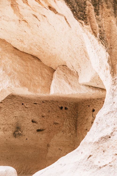 Free Stony rough terrain with carved holes located in wild dry desert on sunny hot day Stock Photo