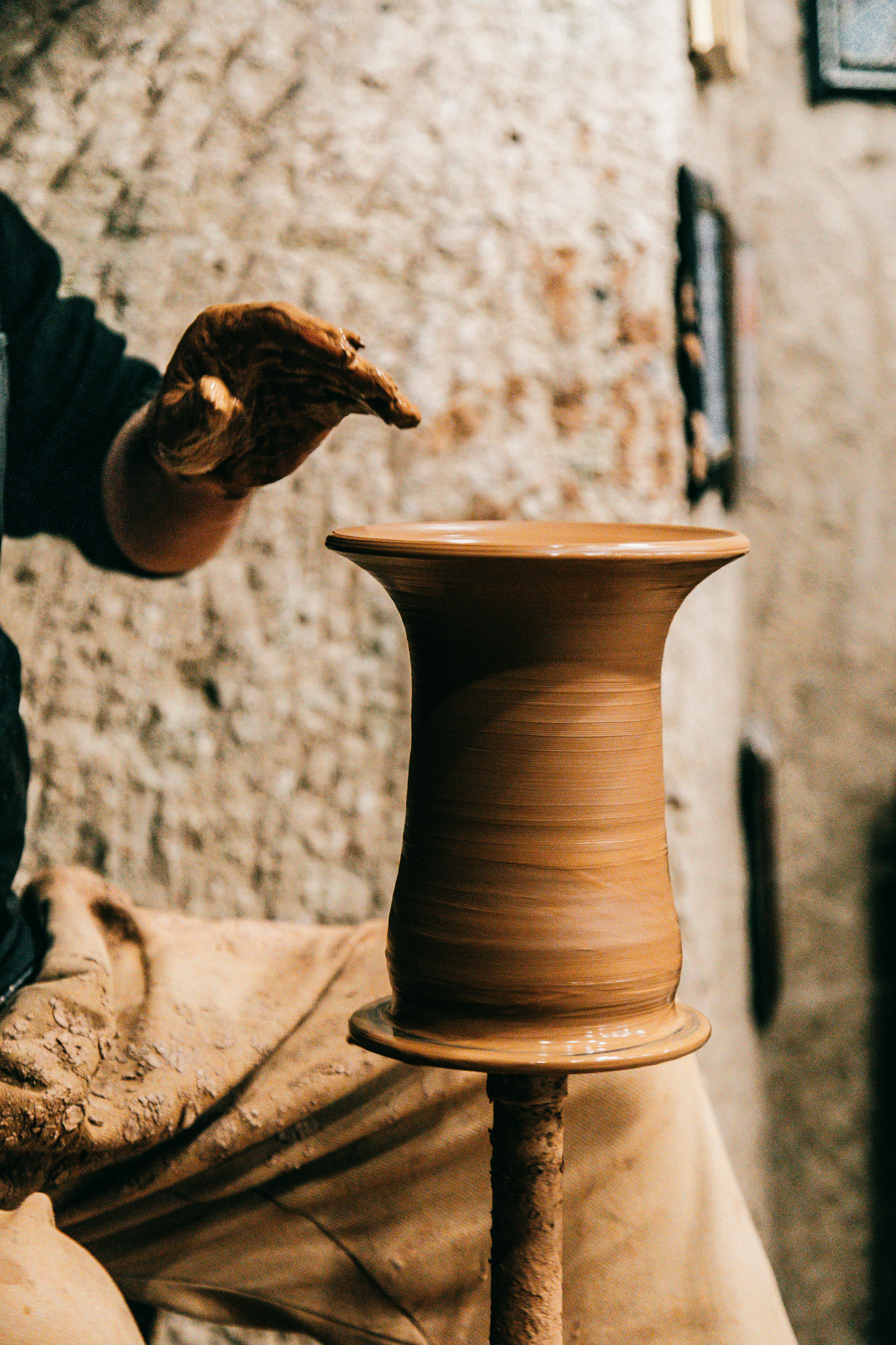 professional master creating handmade clay pot