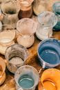Glasses full of paint for handicraft