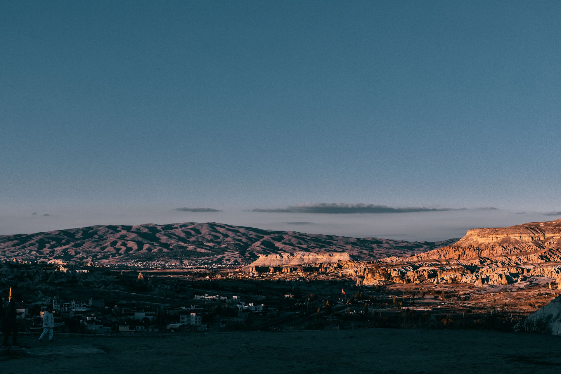 Town located among hills and cliffs