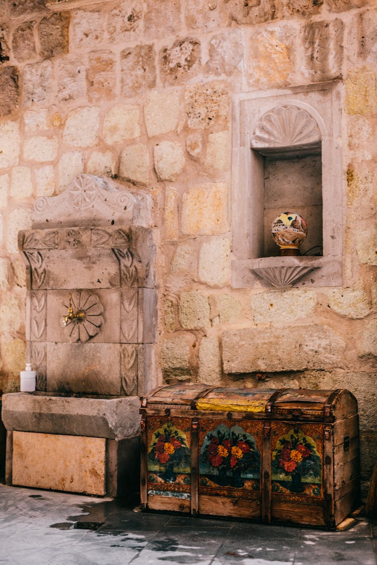 Antique Chest Near Stone Wall