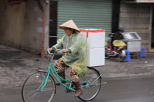 Kostenloses Stock Foto zu alt, asiatische frau, chapéu cònic asiàtic