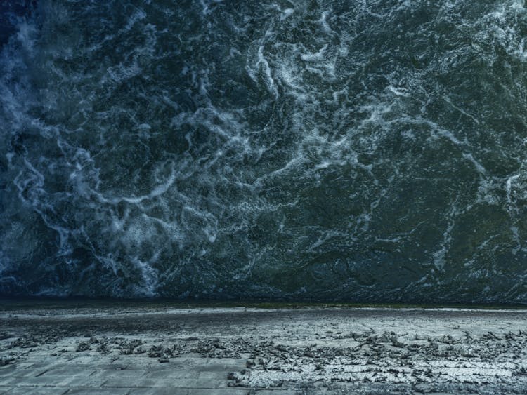 Aerial Photograph Of Water Near A Dam Wall