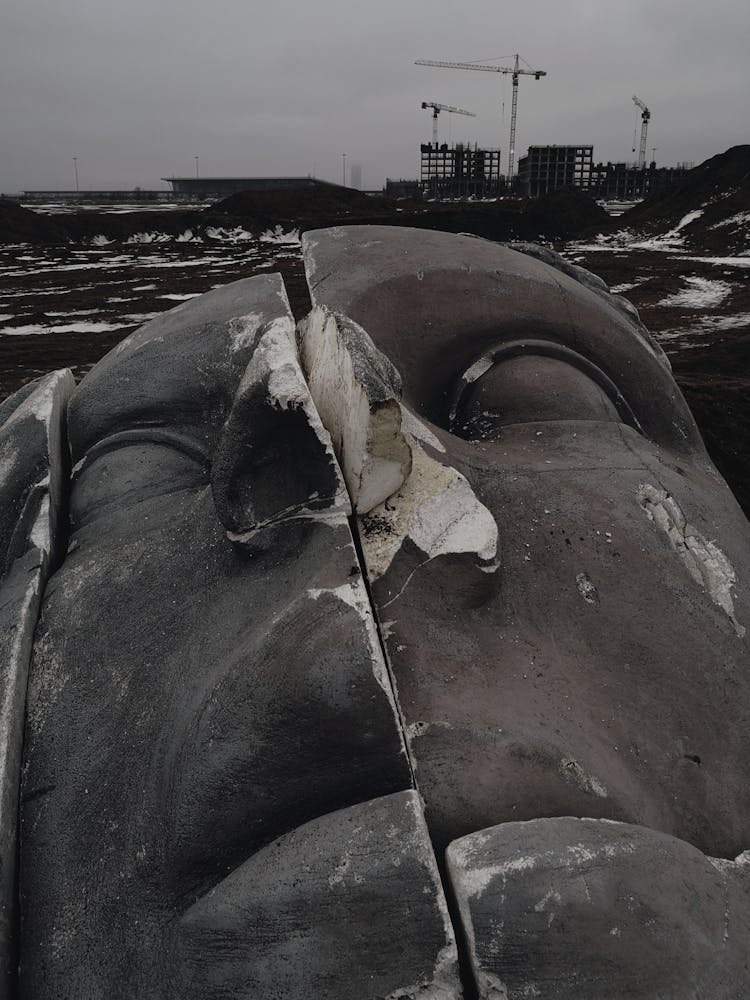 Photo Of A Head Sculpture With A Crack