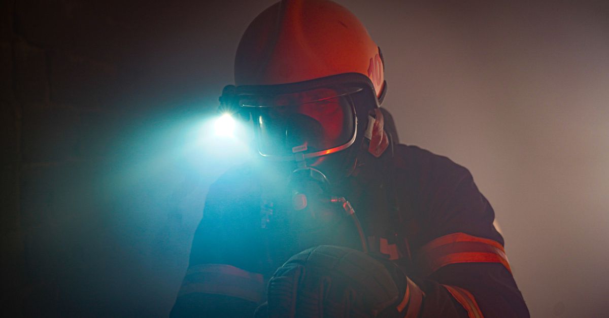 Photo of a Firefighter Wearing a Helmet with a Flashlight · Free Stock ...