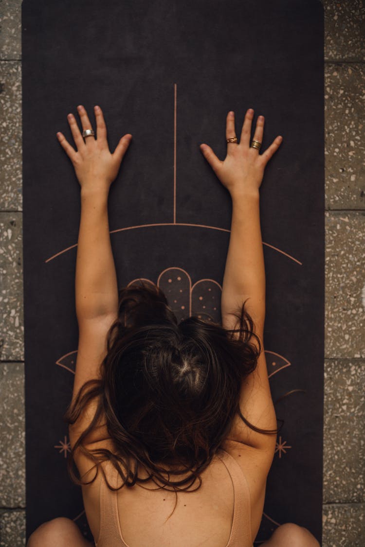 Overhead Shot Of A Woman Meditating