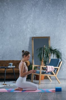 A woman practicing yoga at home, kneeling on a colorful mat, creating a tranquil ambiance.