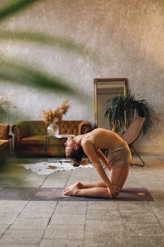 Yoga practitioner in camel pose in a stylish indoor setting, promoting inner peace and flexibility.