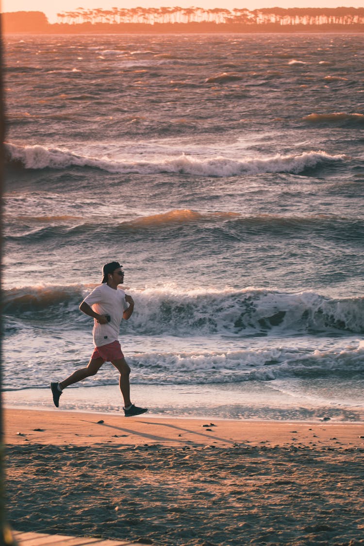 A Man Running On Shore