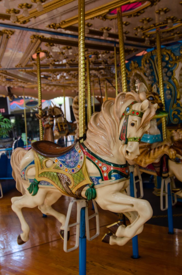 White And Brown Horse Carousel