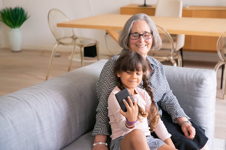 Grandchild Taking A Photo With His Grandma