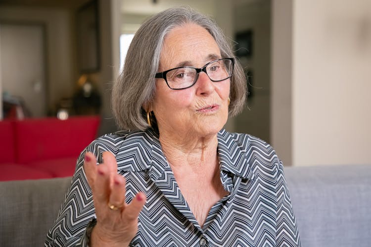 Portrait Of An Elderly Woman With Gray Hair