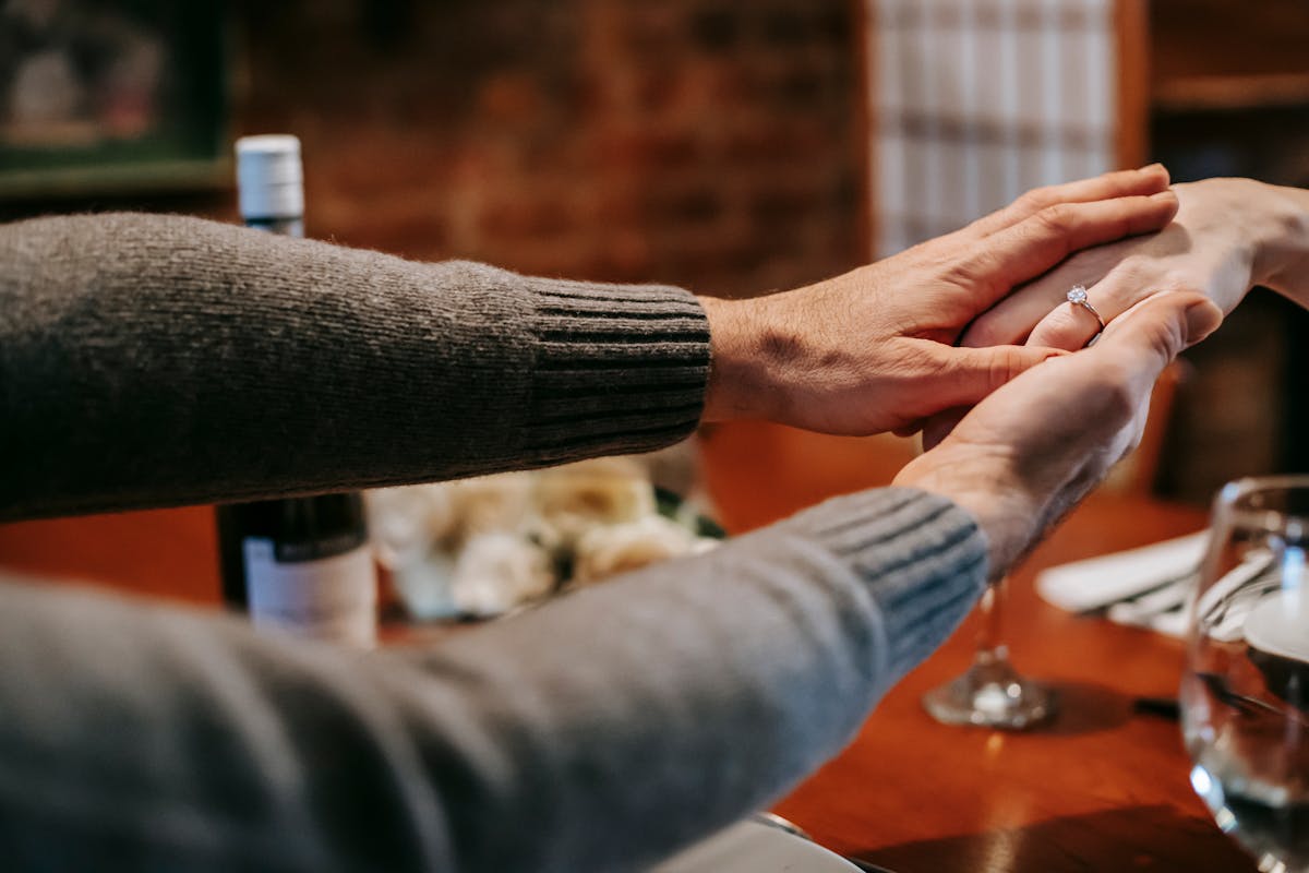 Chopped onions, carrots, celery, and red peppers on a cutting board ready for soup or stew