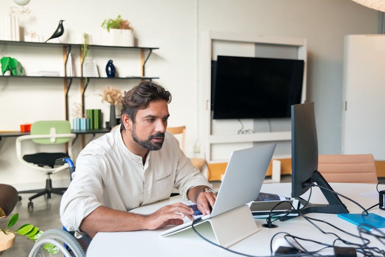 Bearded Man Using A Laptop