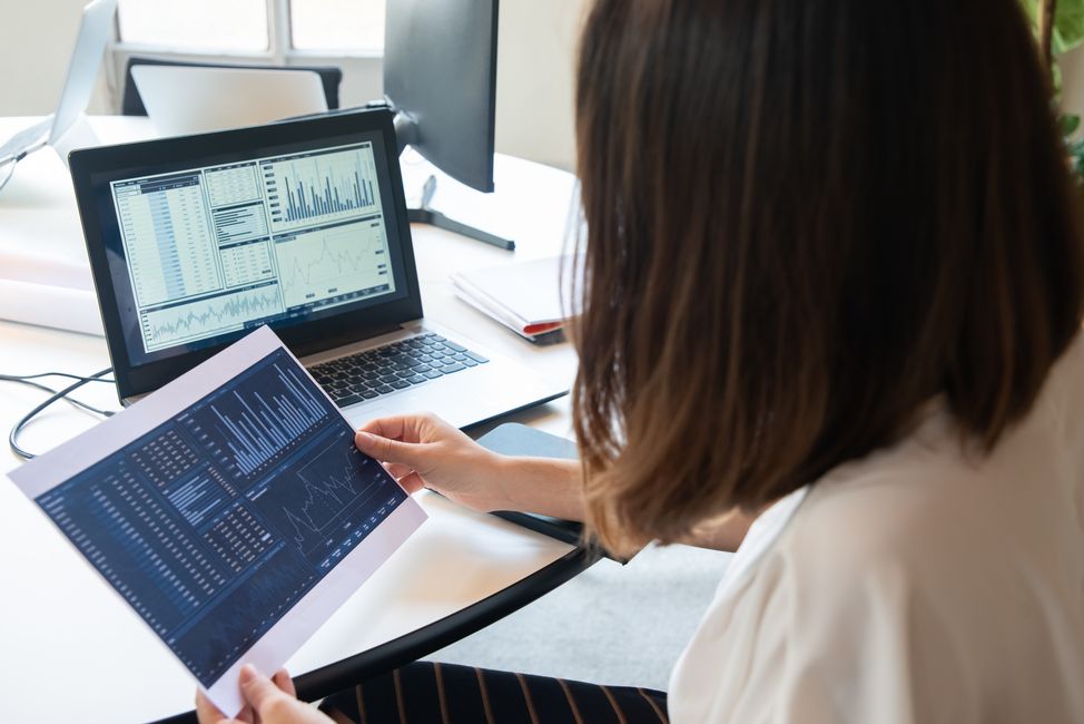 person reviewing analytics graphs