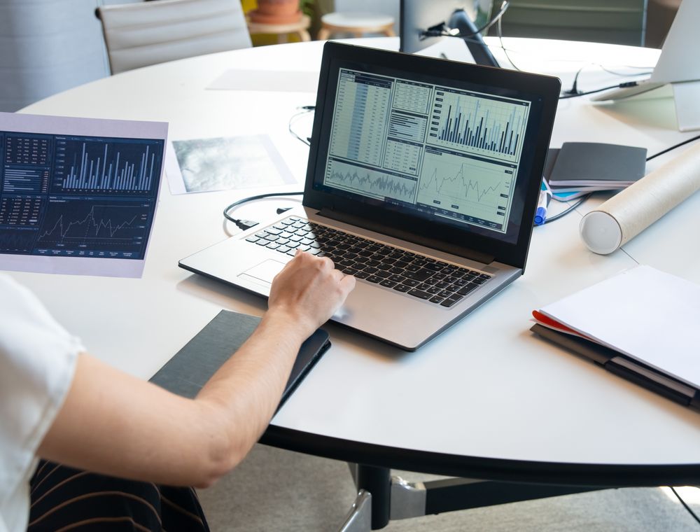 Digital marketing analytics charts on a laptop