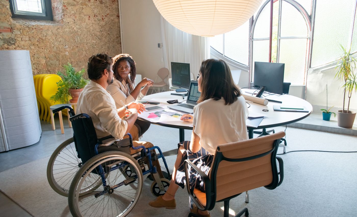 Inclusive team collaborating during an organizational culture and change meeting