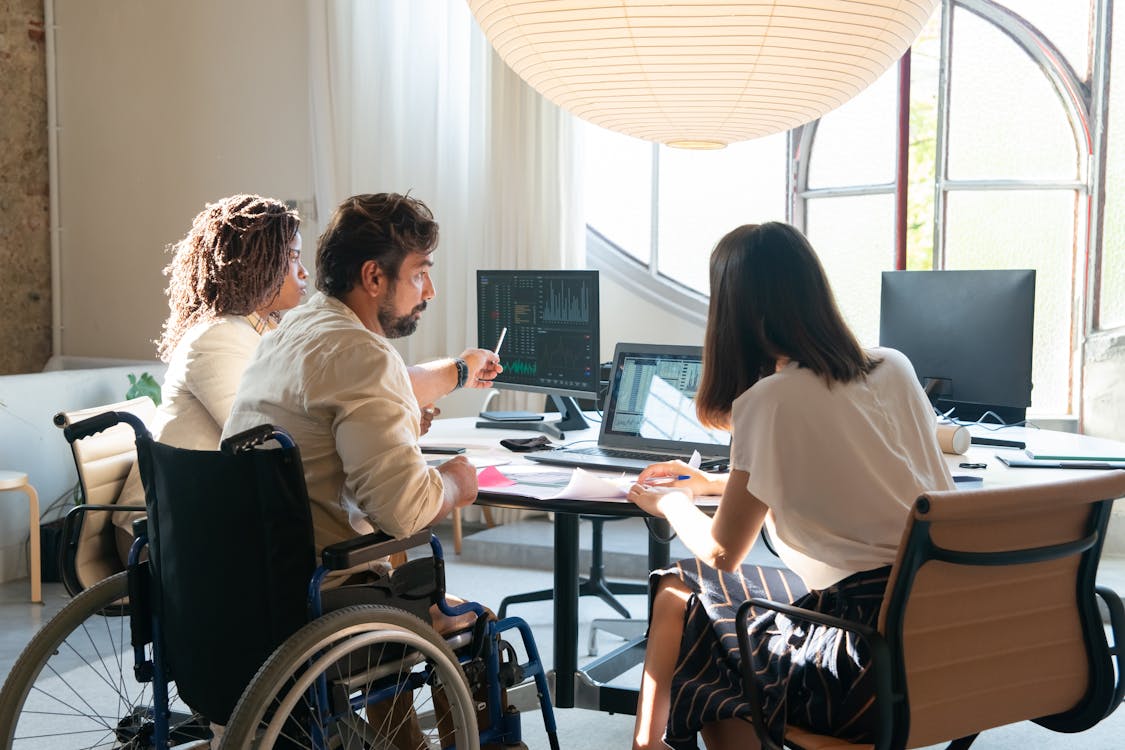 Photograph of an Office Team Working Together