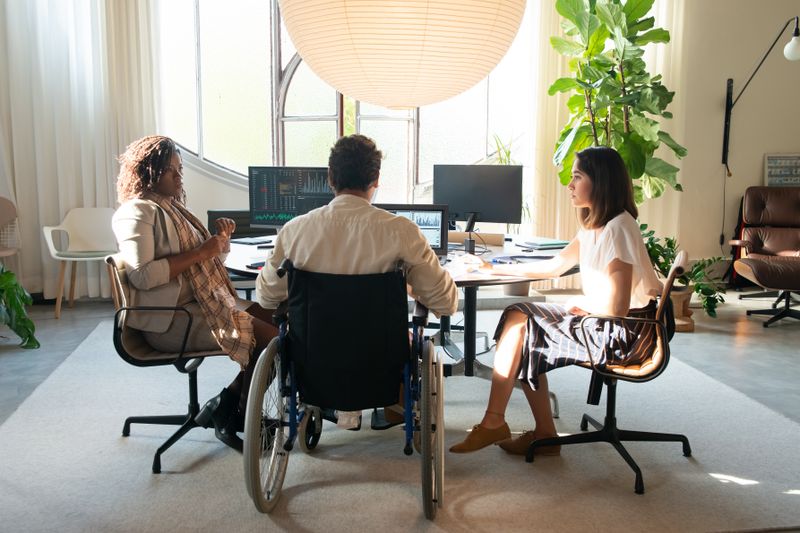 Modern team working together in a bright, accessible office