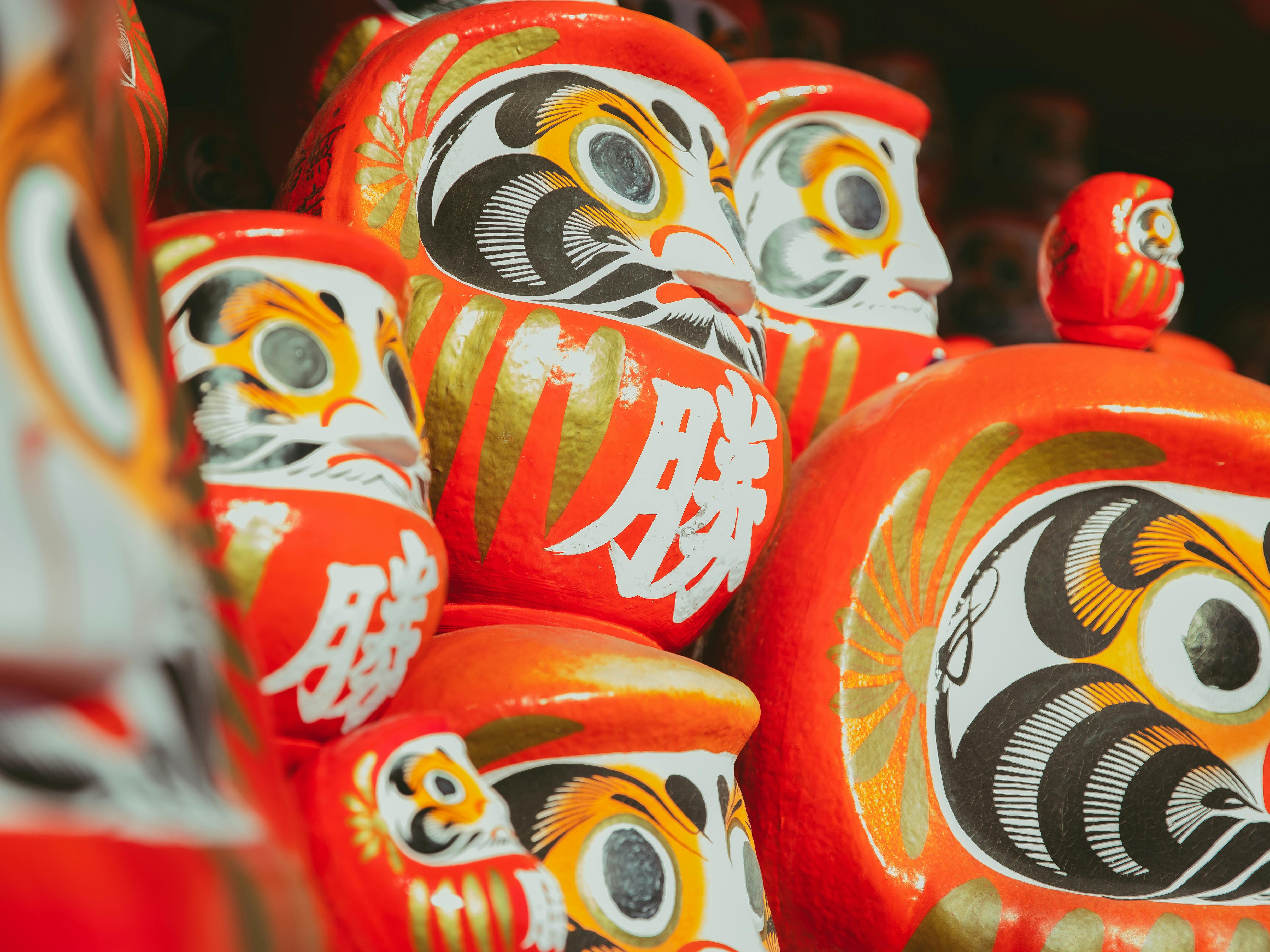 colorful daruma dolls on street