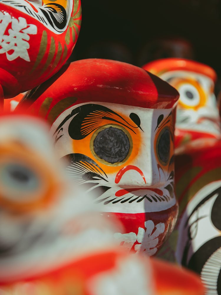 Stack Of Red Daruma Dolls