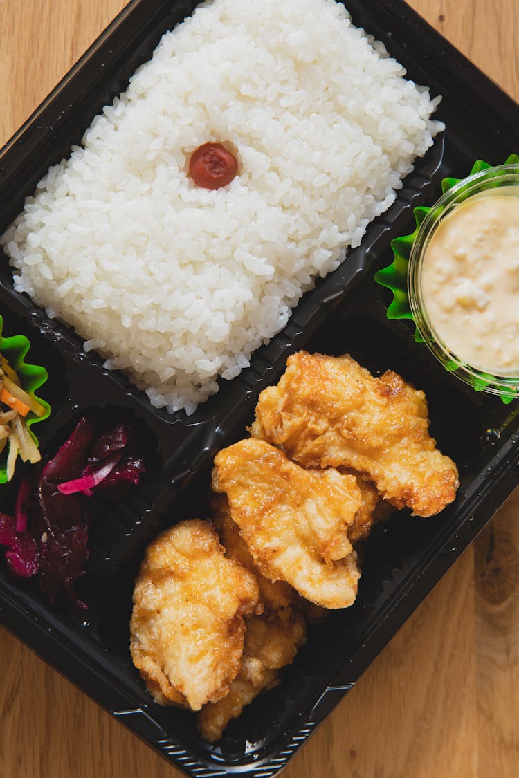 Fried Chicken With Rice And Sauce