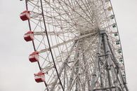 High observation wheel on metal tower