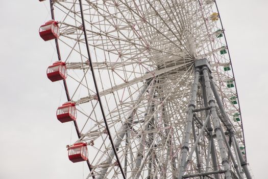 High observation wheel on metal tower