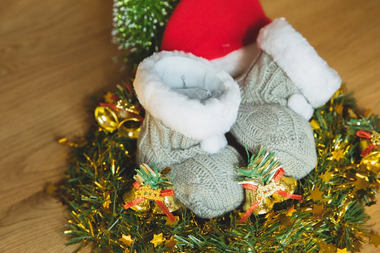 Christmas Booties On Green Wreath