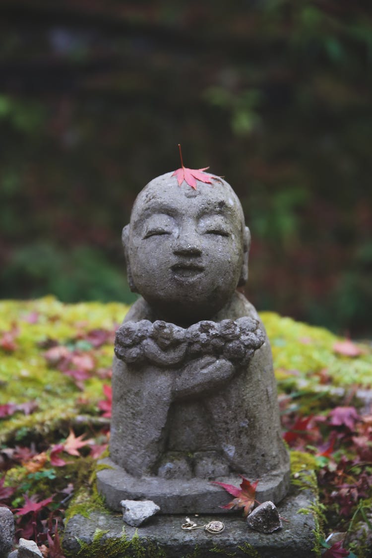 Oriental Statue Placed In Garden