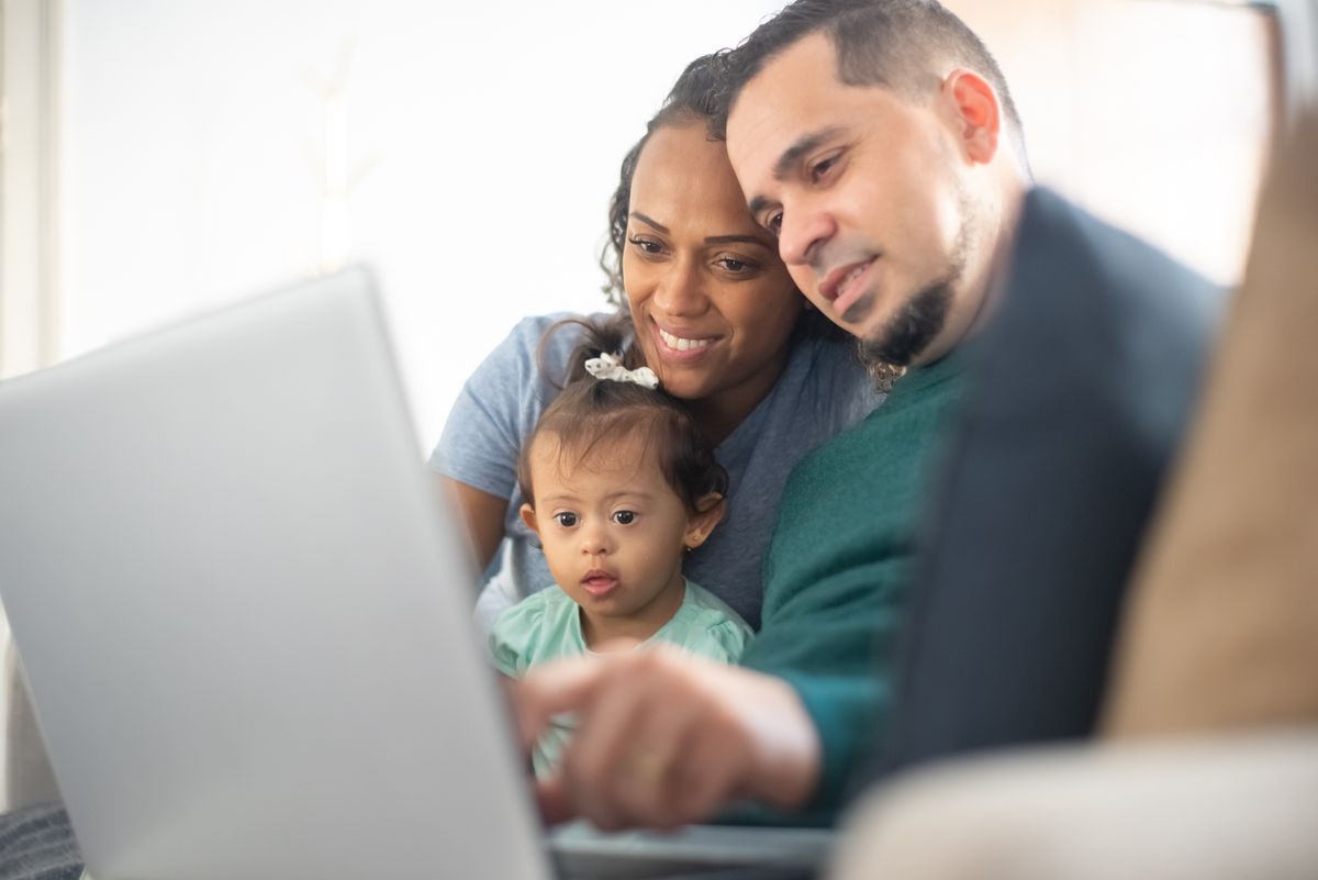 A family reviewing information together at home