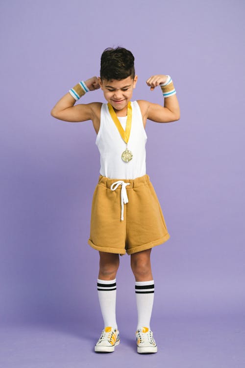 Free A Boy Wearing a Medal Stock Photo