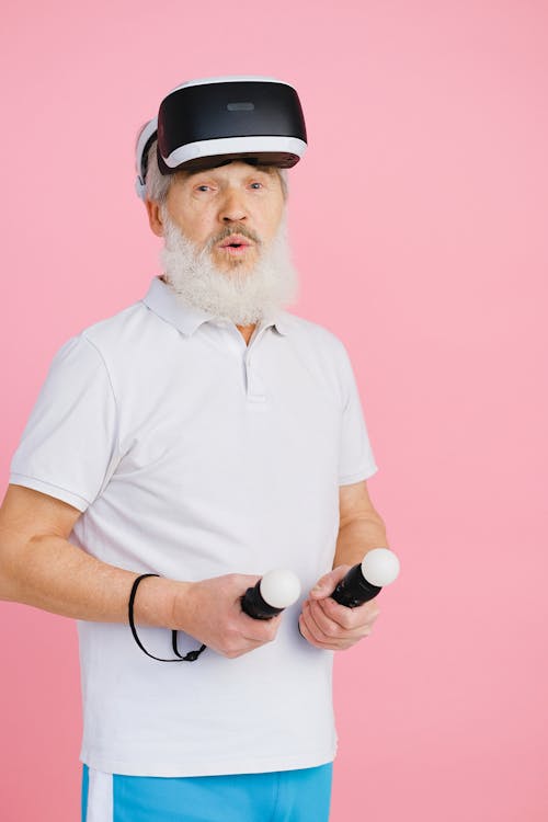 Free An Elderly Man Wearing Virtual Reality Headset Stock Photo