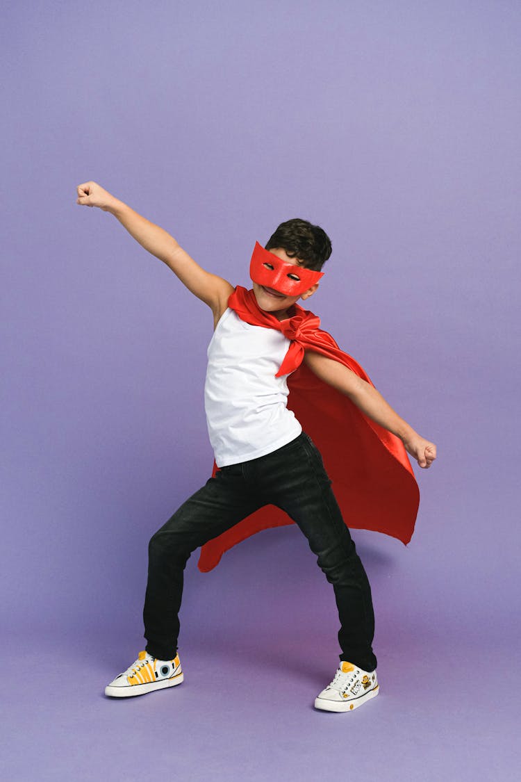 Boy Wearing Red Mask Posing