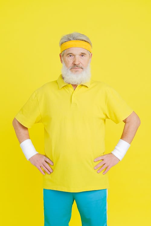 Elderly Man in Yellow Polo Shirt