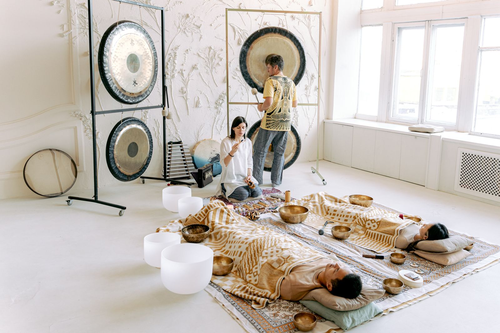 Gongs and bowls with resting participants