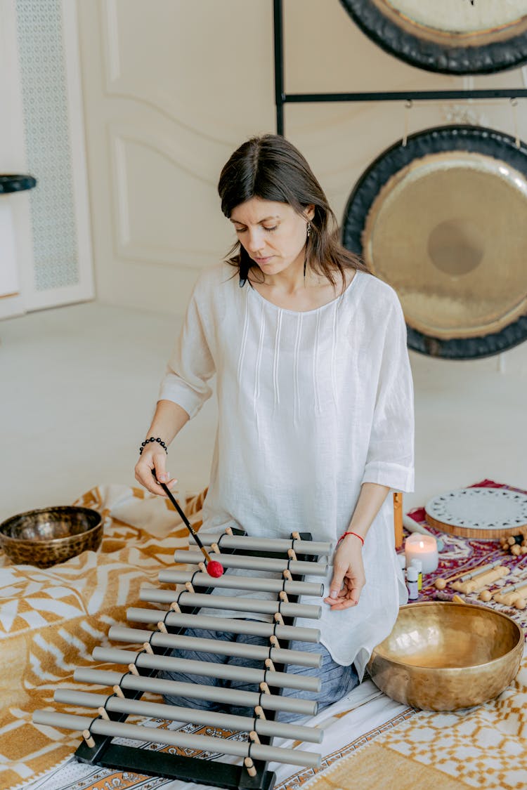 Woman Playing A Xylophone