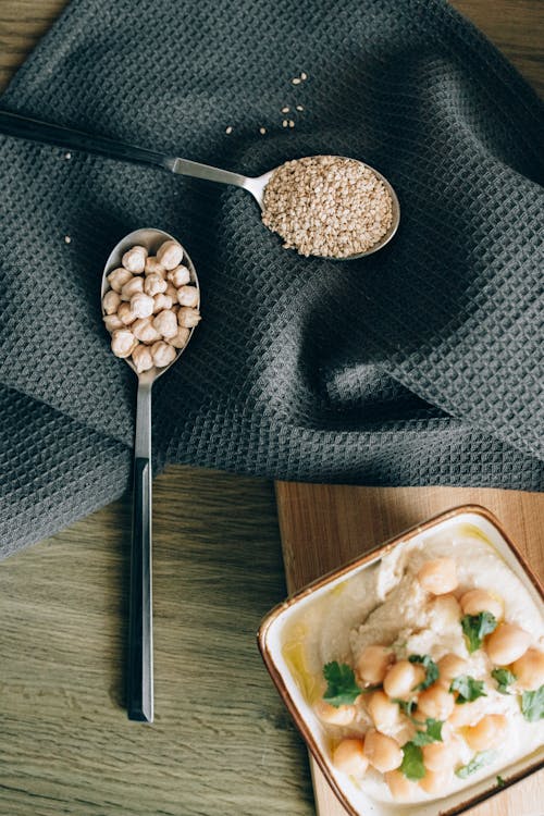 Free Close-Up Shot of Hummus on Bowls Stock Photo