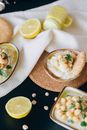 Close-Up Photograph of Hummus on a Saucer