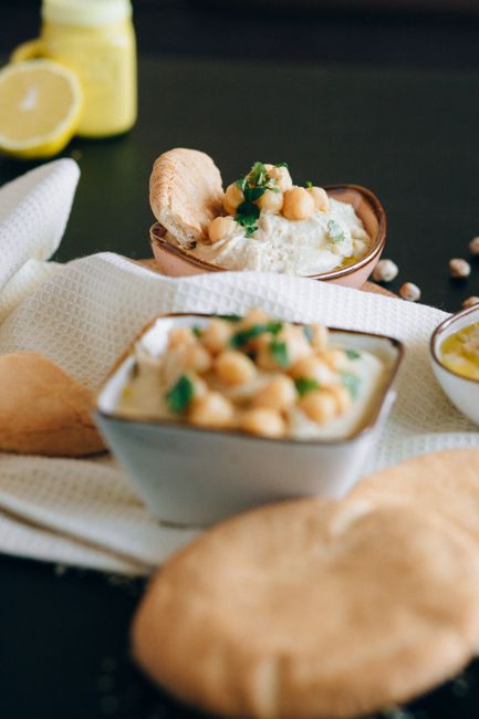 Hummus is a creamy Middle Eastern dip made from blended chickpeas and tahini. What it is and its traditional preparation.